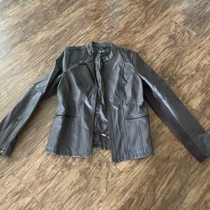 brown “leather” jacket
